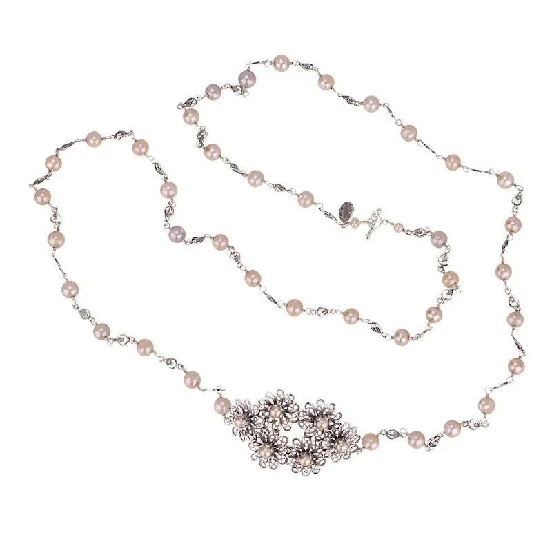 Delicate flower and pearl necklace